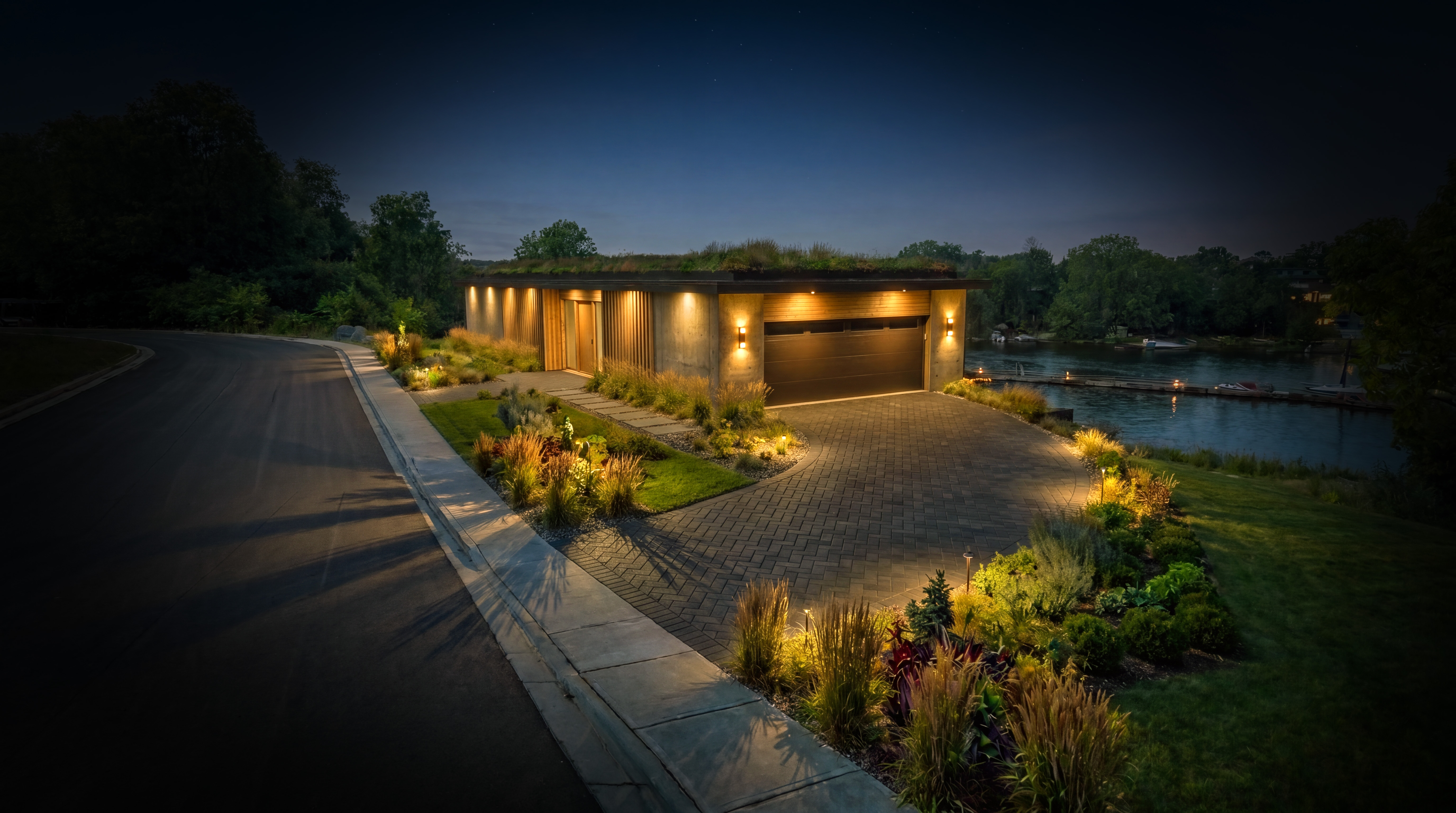 The Panorama Waterfront Villa — Front Elevation & Integrated Garage (Twilight Illumination)